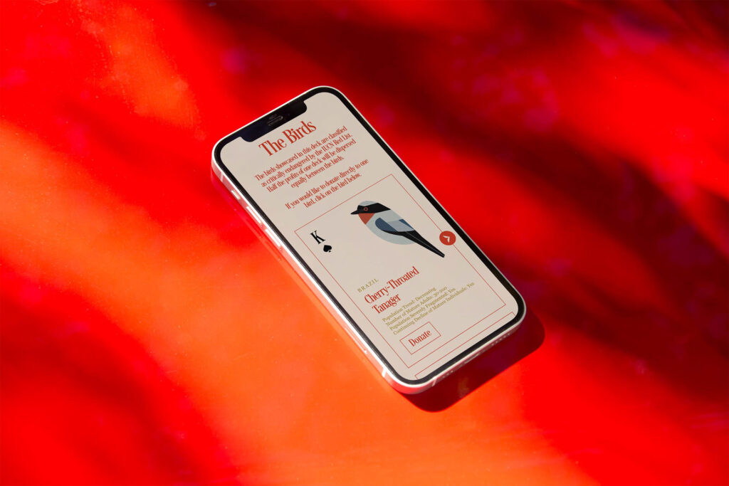 design of web page of cherry throated tanager, shown on mobile