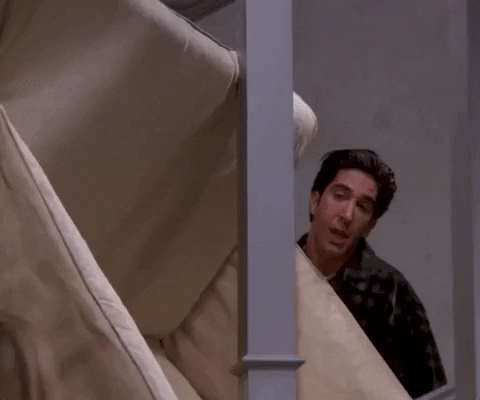 Ross from Friends shouting Pivot!! as he tries to get a couch upstairs