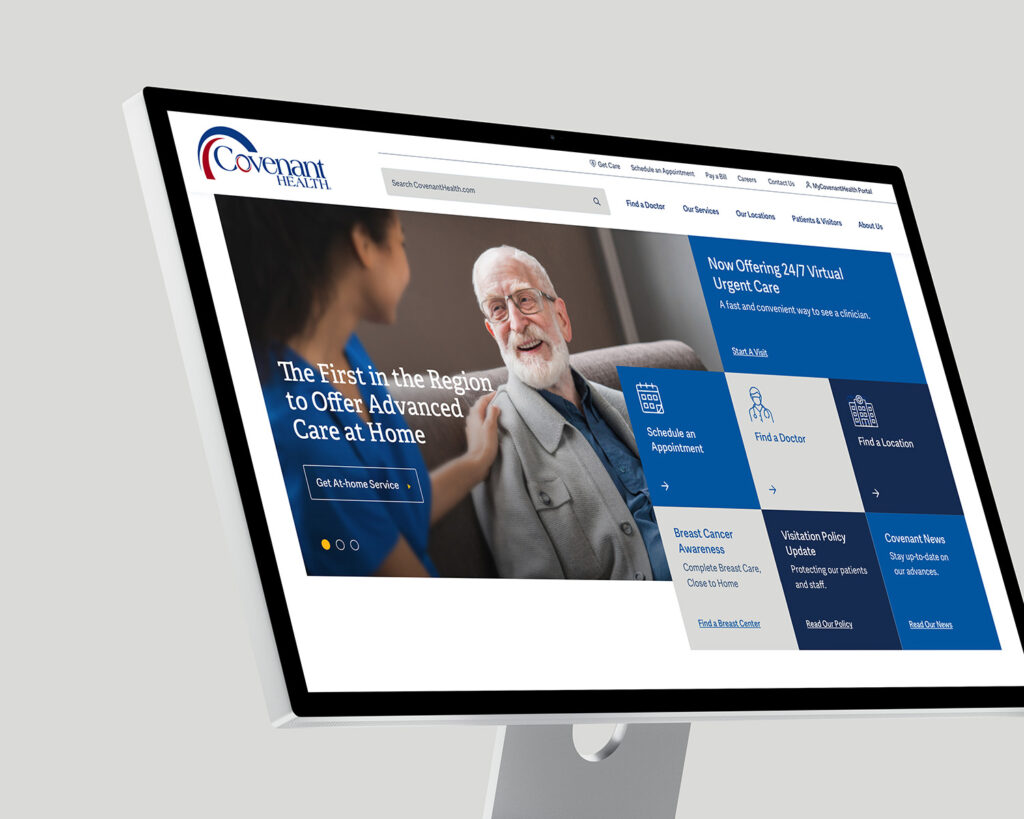 Large computer screen showing Covenant health website.