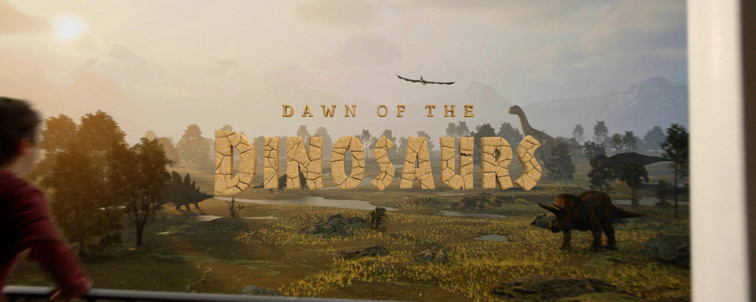 Dawn of the Dinosaurs in stony text in front of a landscape with dinosaurs.